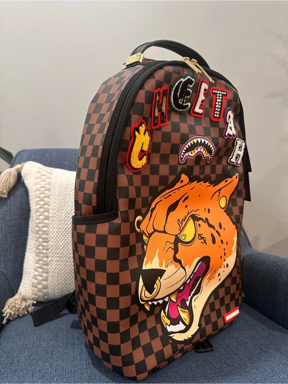 Sprayground Brown Checkerboard Backpack with Orange Tiger Patch